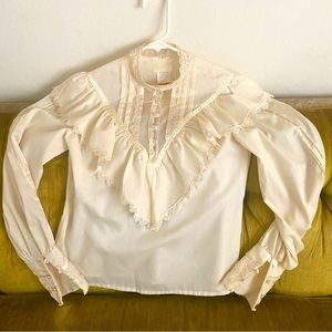 Vintage boho/prairie style blouse. High collar, long sleeves. Good condition.